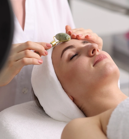 Someone receiving a facial.