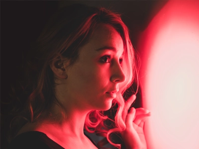 Someone undergoing red light therapy.