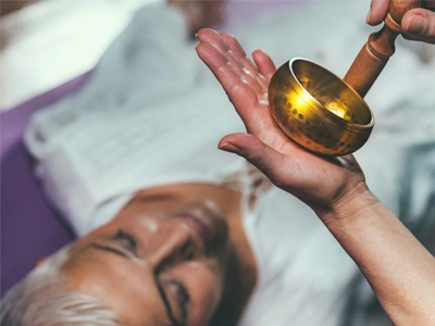 Someone undergoing sound therapy.